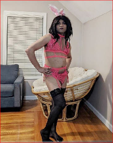 Fully feminised sissy loser mincing around in pink lingerie